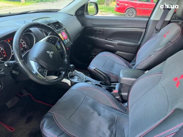 Черный Мицубиси Аутлендер, объемом двигателя 2 л и пробегом 195 тыс. км за 9990 $, фото 10 на Automoto.ua