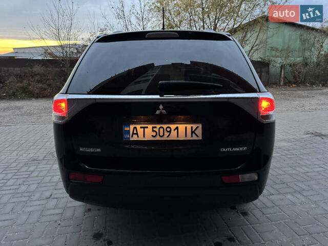 Черный Мицубиси Аутлендер, объемом двигателя 2.27 л и пробегом 241 тыс. км за 14400 $, фото 16 на Automoto.ua