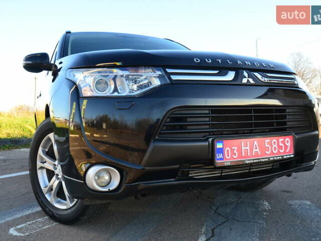 Чорний Міцубісі Аутлендер, об'ємом двигуна 2.2 л та пробігом 237 тис. км за 12550 $, фото 18 на Automoto.ua