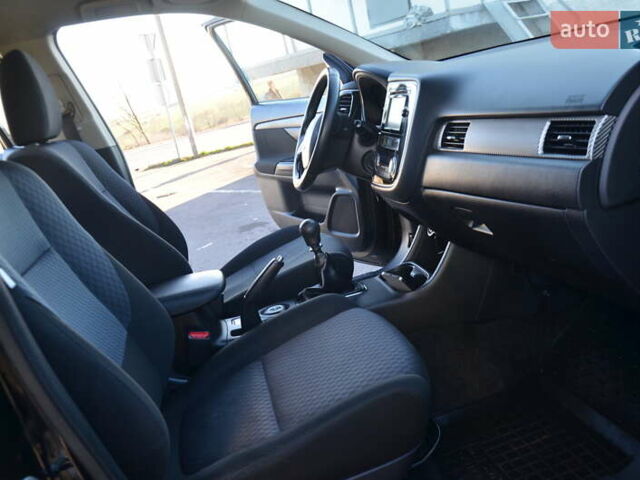 Чорний Міцубісі Аутлендер, об'ємом двигуна 2.2 л та пробігом 237 тис. км за 12550 $, фото 59 на Automoto.ua