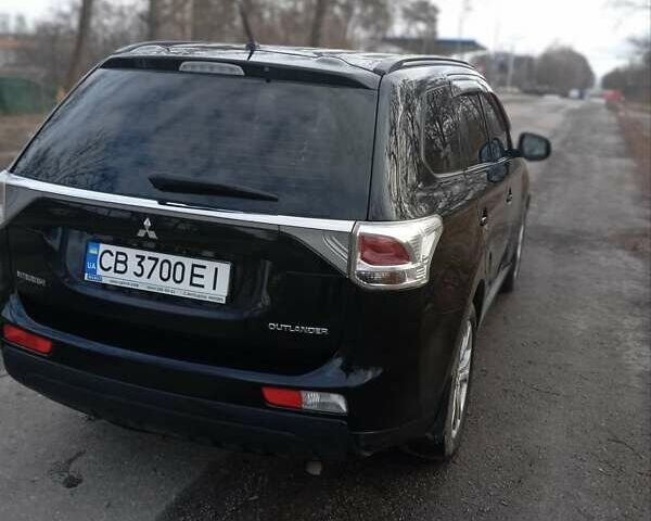 Черный Мицубиси Аутлендер, объемом двигателя 2 л и пробегом 154 тыс. км за 11999 $, фото 9 на Automoto.ua