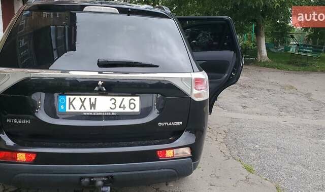 Чорний Міцубісі Аутлендер, об'ємом двигуна 2.2 л та пробігом 250 тис. км за 11900 $, фото 10 на Automoto.ua