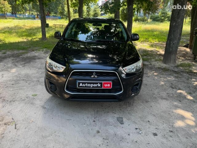 Черный Мицубиси Аутлендер, объемом двигателя 2 л и пробегом 195 тыс. км за 9990 $, фото 1 на Automoto.ua