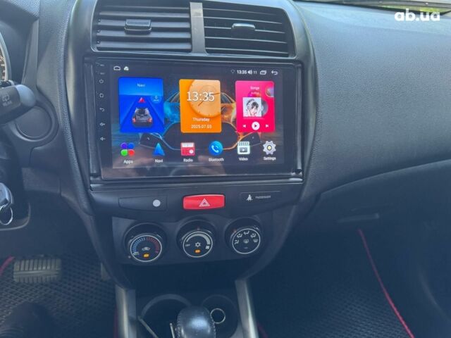 Черный Мицубиси Аутлендер, объемом двигателя 2 л и пробегом 195 тыс. км за 9990 $, фото 12 на Automoto.ua