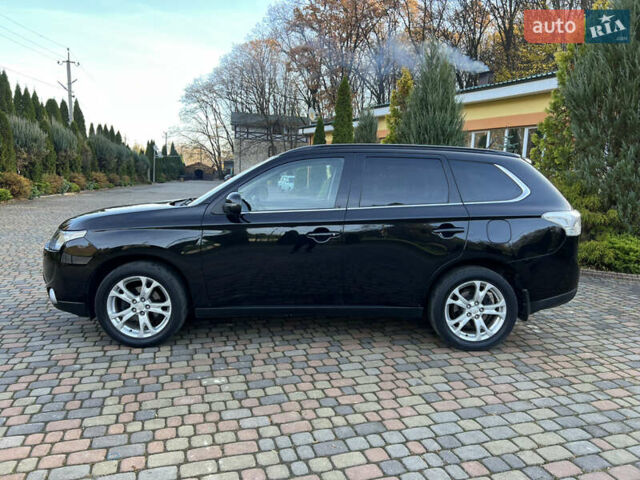 Черный Мицубиси Аутлендер, объемом двигателя 2 л и пробегом 190 тыс. км за 12500 $, фото 12 на Automoto.ua