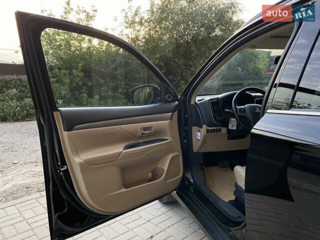 Черный Мицубиси Аутлендер, объемом двигателя 2.27 л и пробегом 241 тыс. км за 14400 $, фото 50 на Automoto.ua