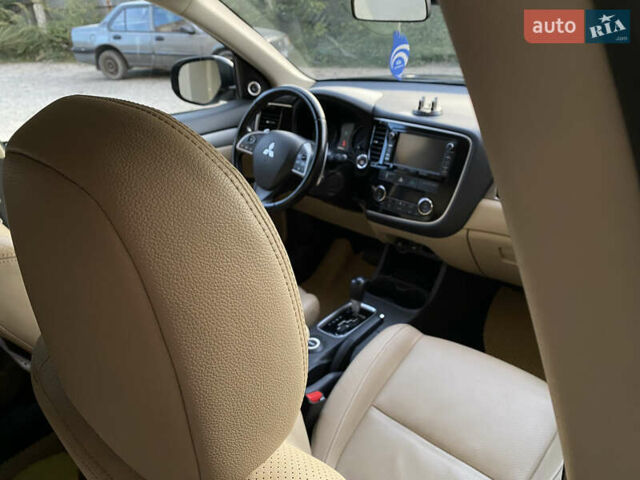 Черный Мицубиси Аутлендер, объемом двигателя 2.27 л и пробегом 241 тыс. км за 14400 $, фото 35 на Automoto.ua