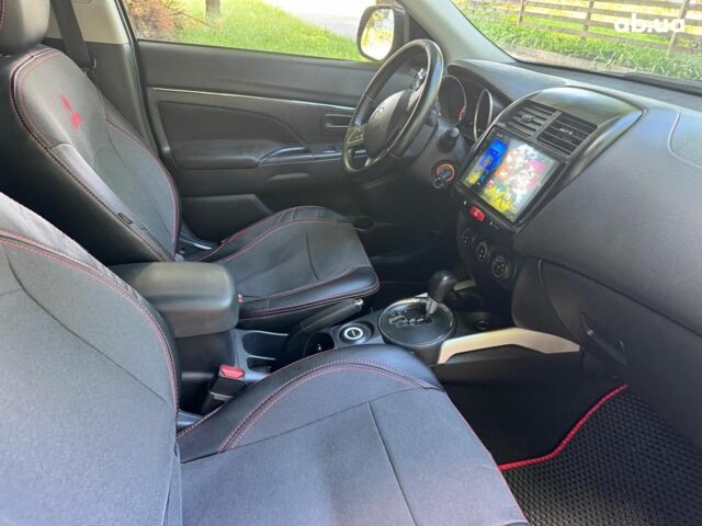 Черный Мицубиси Аутлендер, объемом двигателя 2 л и пробегом 195 тыс. км за 9990 $, фото 21 на Automoto.ua