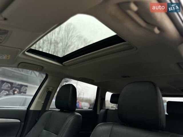 Чорний Міцубісі Аутлендер, об'ємом двигуна 2 л та пробігом 213 тис. км за 13888 $, фото 17 на Automoto.ua