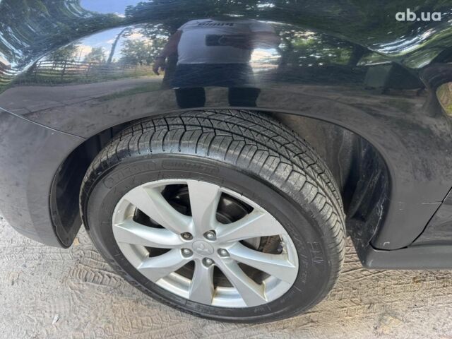 Черный Мицубиси Аутлендер, объемом двигателя 2 л и пробегом 195 тыс. км за 9990 $, фото 8 на Automoto.ua