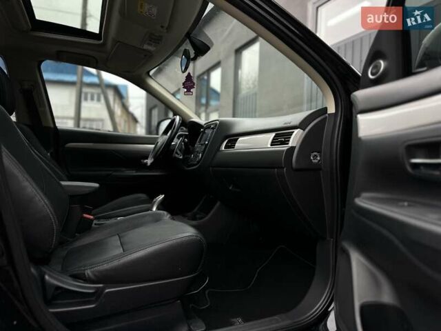 Чорний Міцубісі Аутлендер, об'ємом двигуна 2 л та пробігом 213 тис. км за 13888 $, фото 21 на Automoto.ua