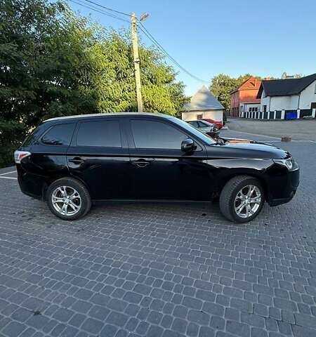 Мицубиси Аутлендер 2013 в Львове на Automoto.ua Черный Мицубиси Аутлендер, объемом двигателя 2.4 л и пробегом 236 тыс. км за 13000 $, фото 3 на Automoto.ua