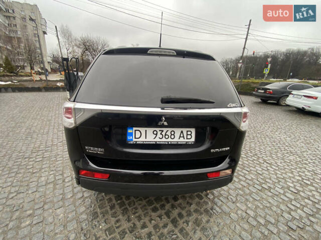 Черный Мицубиси Аутлендер, объемом двигателя 2.27 л и пробегом 280 тыс. км за 11808 $, фото 19 на Automoto.ua