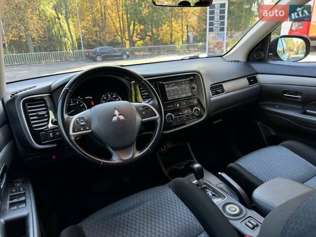 Чорний Міцубісі Аутлендер, об'ємом двигуна 2.36 л та пробігом 220 тис. км за 11000 $, фото 8 на Automoto.ua