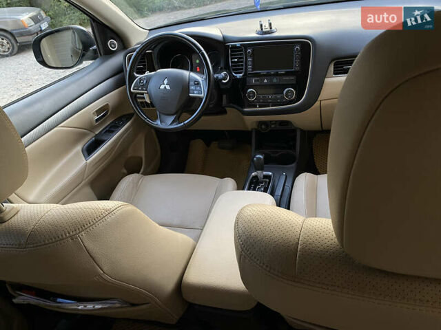 Черный Мицубиси Аутлендер, объемом двигателя 2.27 л и пробегом 241 тыс. км за 14400 $, фото 36 на Automoto.ua