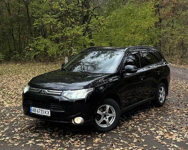 Міцубісі Аутлендер 2013 у Броварах на Automoto.ua Чорний Міцубісі Аутлендер, об'ємом двигуна 2.36 л та пробігом 168 тис. км за 11700 $, фото 1 на Automoto.ua