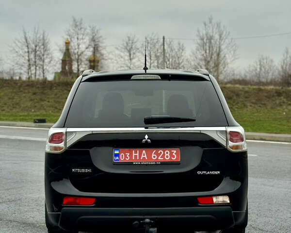 Черный Мицубиси Аутлендер, объемом двигателя 2.2 л и пробегом 250 тыс. км за 12750 $, фото 6 на Automoto.ua