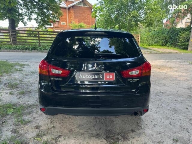 Черный Мицубиси Аутлендер, объемом двигателя 2 л и пробегом 195 тыс. км за 9990 $, фото 5 на Automoto.ua