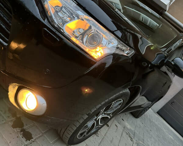 Черный Мицубиси Аутлендер, объемом двигателя 2.27 л и пробегом 241 тыс. км за 14400 $, фото 22 на Automoto.ua