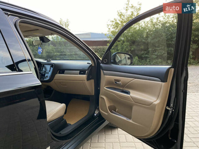 Черный Мицубиси Аутлендер, объемом двигателя 2.27 л и пробегом 241 тыс. км за 14400 $, фото 25 на Automoto.ua