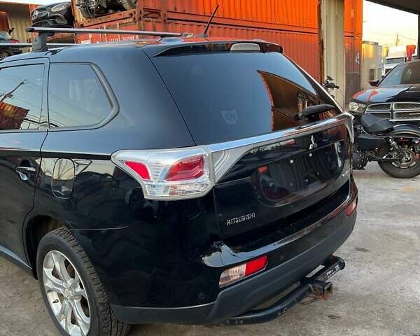 Черный Мицубиси Аутлендер, объемом двигателя 2.36 л и пробегом 226 тыс. км за 12499 $, фото 11 на Automoto.ua