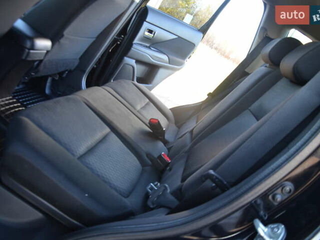 Чорний Міцубісі Аутлендер, об'ємом двигуна 2.2 л та пробігом 237 тис. км за 12550 $, фото 45 на Automoto.ua