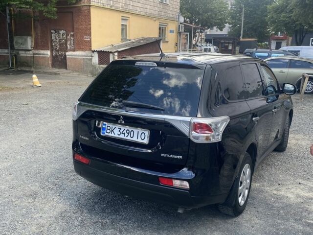 Черный Мицубиси Аутлендер, объемом двигателя 2 л и пробегом 168 тыс. км за 12007 $, фото 3 на Automoto.ua