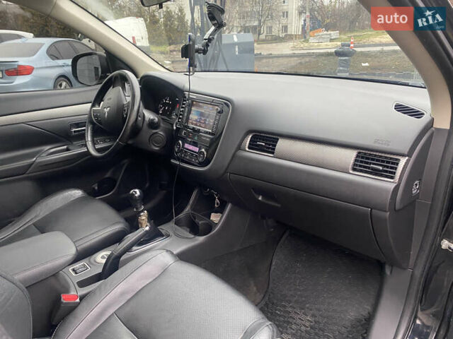 Черный Мицубиси Аутлендер, объемом двигателя 2.27 л и пробегом 280 тыс. км за 11808 $, фото 11 на Automoto.ua