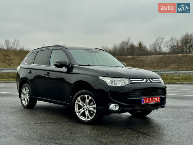 Черный Мицубиси Аутлендер, объемом двигателя 2.2 л и пробегом 250 тыс. км за 12750 $, фото 2 на Automoto.ua