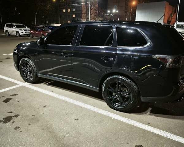 Черный Мицубиси Аутлендер, объемом двигателя 2.36 л и пробегом 226 тыс. км за 12499 $, фото 32 на Automoto.ua