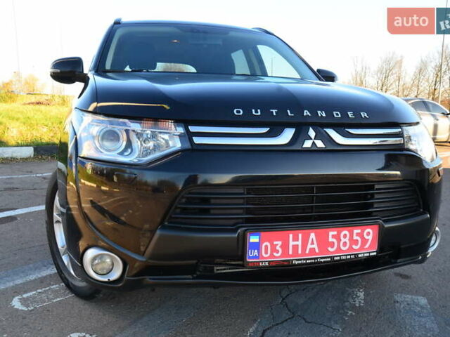 Чорний Міцубісі Аутлендер, об'ємом двигуна 2.2 л та пробігом 237 тис. км за 12550 $, фото 16 на Automoto.ua