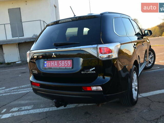 Чорний Міцубісі Аутлендер, об'ємом двигуна 2.2 л та пробігом 237 тис. км за 12550 $, фото 34 на Automoto.ua