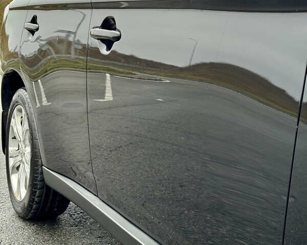 Черный Мицубиси Аутлендер, объемом двигателя 2.2 л и пробегом 250 тыс. км за 12750 $, фото 11 на Automoto.ua