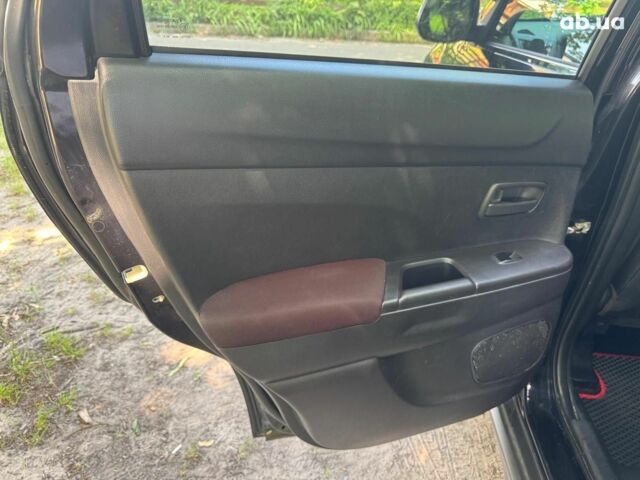 Черный Мицубиси Аутлендер, объемом двигателя 2 л и пробегом 195 тыс. км за 9990 $, фото 14 на Automoto.ua