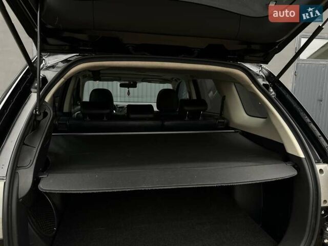 Чорний Міцубісі Аутлендер, об'ємом двигуна 2 л та пробігом 213 тис. км за 13888 $, фото 30 на Automoto.ua