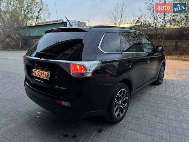 Черный Мицубиси Аутлендер, объемом двигателя 2.27 л и пробегом 241 тыс. км за 14400 $, фото 12 на Automoto.ua