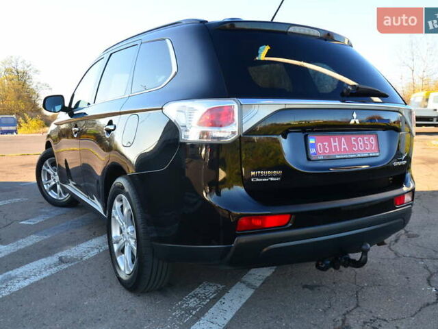 Чорний Міцубісі Аутлендер, об'ємом двигуна 2.2 л та пробігом 237 тис. км за 12550 $, фото 25 на Automoto.ua