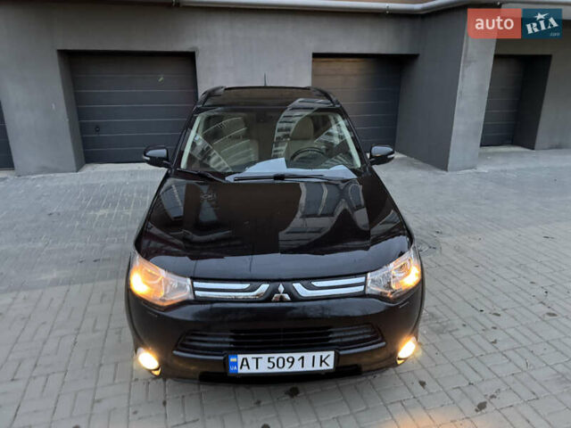 Черный Мицубиси Аутлендер, объемом двигателя 2.27 л и пробегом 241 тыс. км за 14400 $, фото 5 на Automoto.ua