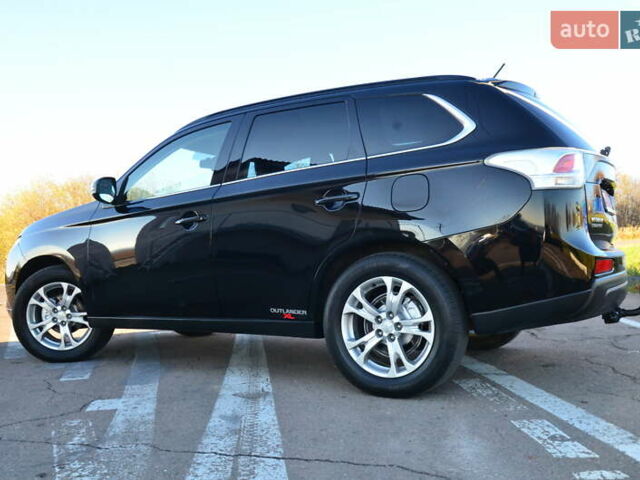 Чорний Міцубісі Аутлендер, об'ємом двигуна 2.2 л та пробігом 237 тис. км за 12550 $, фото 28 на Automoto.ua