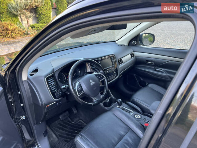 Черный Мицубиси Аутлендер, объемом двигателя 2 л и пробегом 190 тыс. км за 12500 $, фото 18 на Automoto.ua