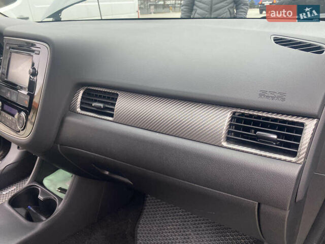 Черный Мицубиси Аутлендер, объемом двигателя 2.4 л и пробегом 150 тыс. км за 13700 $, фото 8 на Automoto.ua