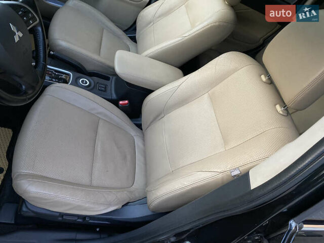 Черный Мицубиси Аутлендер, объемом двигателя 2.27 л и пробегом 241 тыс. км за 14400 $, фото 55 на Automoto.ua