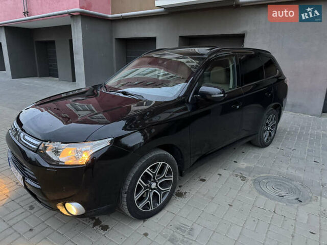Черный Мицубиси Аутлендер, объемом двигателя 2.27 л и пробегом 241 тыс. км за 14400 $, фото 21 на Automoto.ua