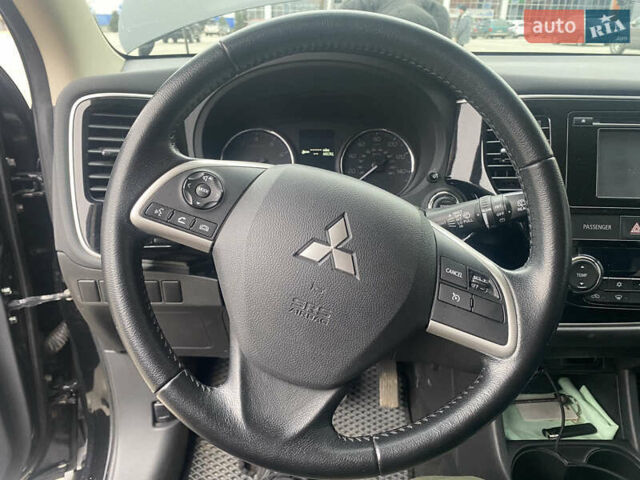 Черный Мицубиси Аутлендер, объемом двигателя 2.4 л и пробегом 150 тыс. км за 13700 $, фото 14 на Automoto.ua
