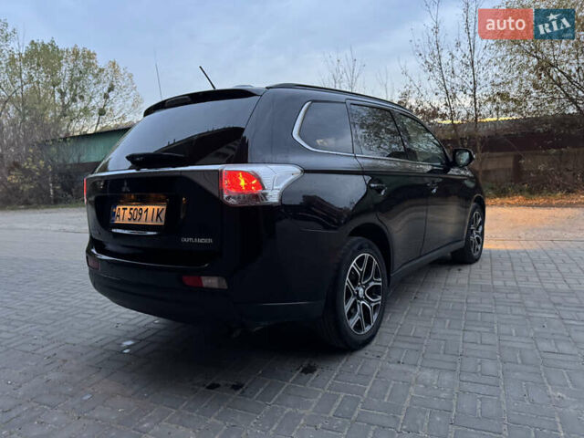 Черный Мицубиси Аутлендер, объемом двигателя 2.27 л и пробегом 241 тыс. км за 14400 $, фото 13 на Automoto.ua