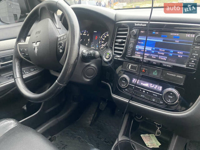 Черный Мицубиси Аутлендер, объемом двигателя 2.27 л и пробегом 280 тыс. км за 11808 $, фото 10 на Automoto.ua