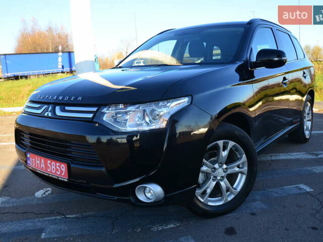 Чорний Міцубісі Аутлендер, об'ємом двигуна 2.2 л та пробігом 237 тис. км за 12550 $, фото 10 на Automoto.ua