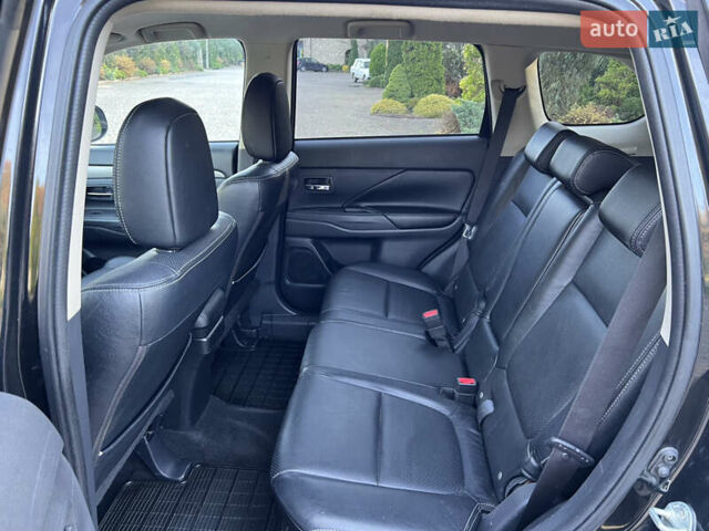 Черный Мицубиси Аутлендер, объемом двигателя 2 л и пробегом 190 тыс. км за 12500 $, фото 23 на Automoto.ua