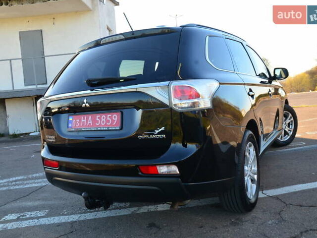 Чорний Міцубісі Аутлендер, об'ємом двигуна 2.2 л та пробігом 237 тис. км за 12550 $, фото 30 на Automoto.ua