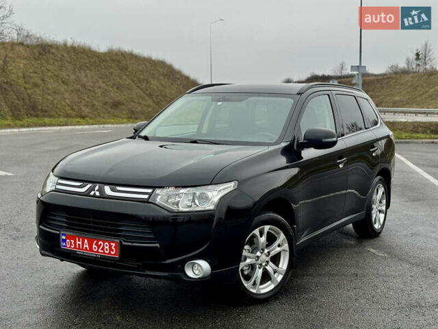 Черный Мицубиси Аутлендер, объемом двигателя 2.2 л и пробегом 250 тыс. км за 12750 $, фото 4 на Automoto.ua